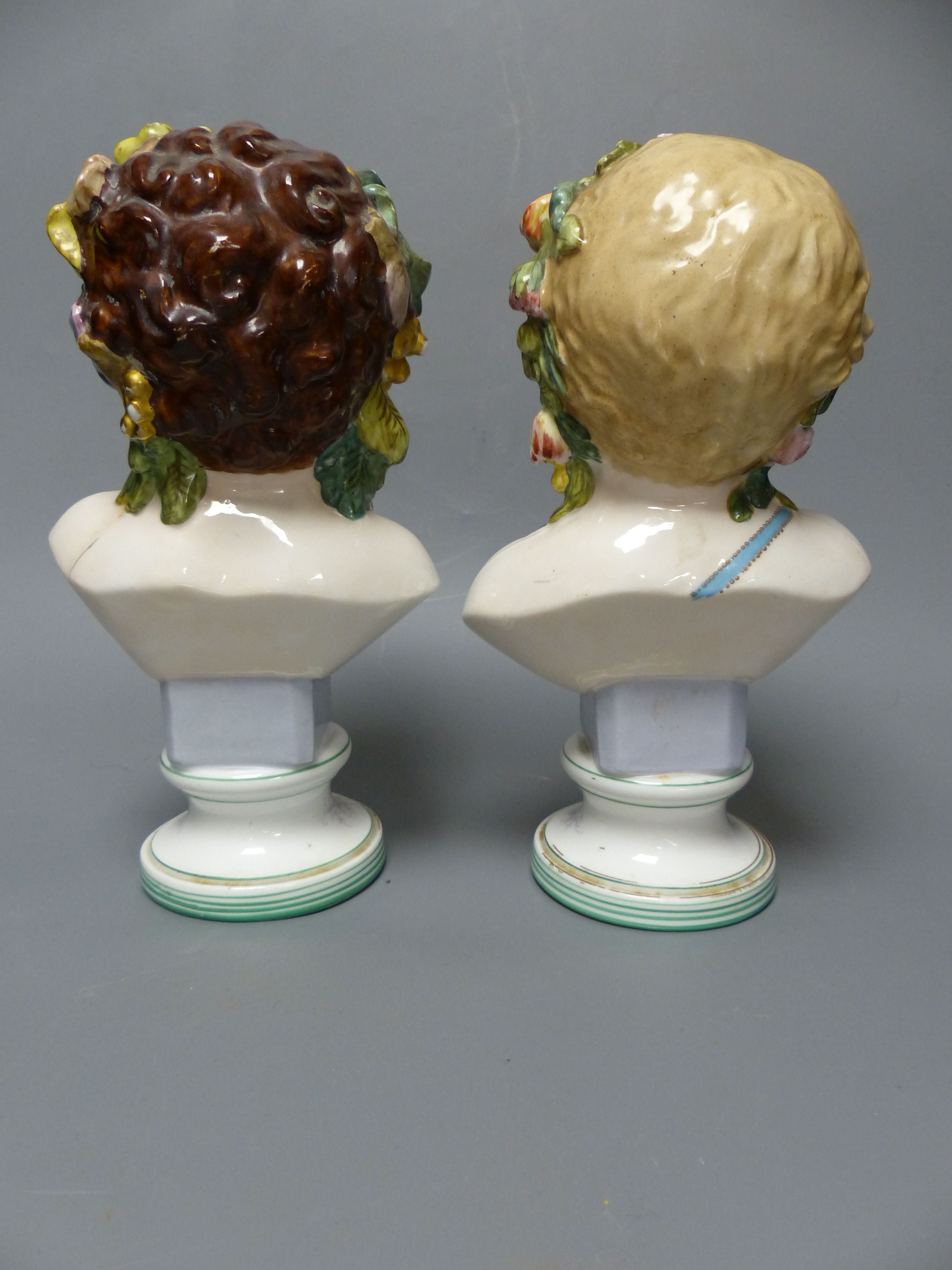 A pair of French porcelain busts Automne and Printemps, a Samson ewer and basin in the Chinese export style and a pair Belleek styl